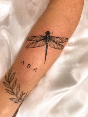 Get a stunning illustrative dragonfly tattoo designed by the talented artist Gabriela, perfect for those who love nature and beauty.