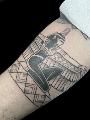 Experience the magic of ancient Egypt with this stunning illustrative Isis tattoo by Rose Harley. Perfect for those who appreciate powerful symbolism.