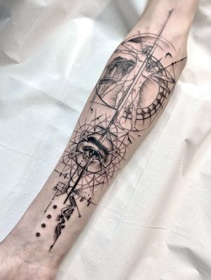 Unique black and gray tattoo by Beyza Taser featuring a geometric interpretation of the Vitruvian Man with an eye motif.