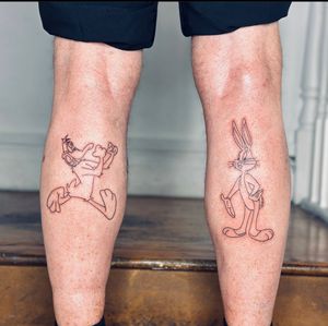 Get inked with Bugs Bunny and Daffy Duck in a sleek illustrative style by talented artist Tal.