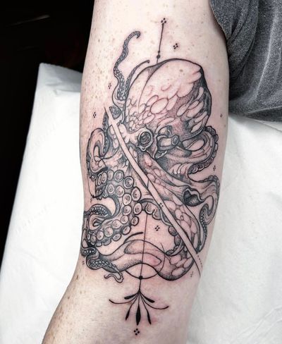 Admire the intricate lines and shapes of this stunning geometric octopus tattoo by the talented artist Beyza Taser.