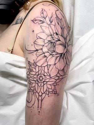 Elegant and intricate floral design incorporating a cross, created by tattoo artist Beyza Taser in fine line and ornamental style.