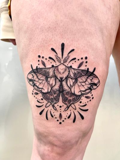 Adorn your skin with a stunning black and gray moth tattoo, expertly crafted by Beyza Taser in a intricate ornamental and illustrative style.