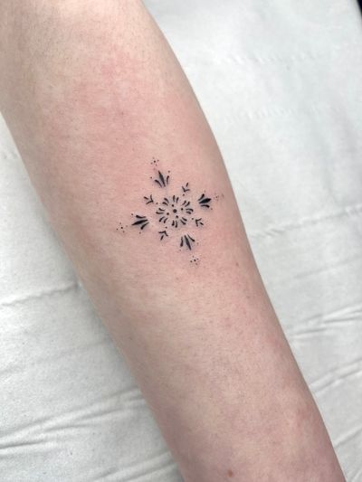 Experience intricate and dainty blackwork design by Beyza Taser, perfect for those seeking delicate and elegant body art.