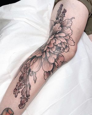 Get a stunning illustrative floral tattoo of a delicate flower by Beyza Taser for a unique and elegant look.