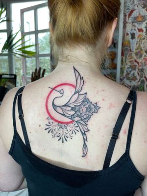 Beautiful illustrative tattoo by Beyza Taser featuring a unique blend of abstract flower and heron motifs. Perfect for nature lovers.