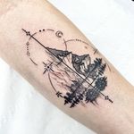 Capture the beauty of the sea, mountain, and forest with this intricate and unique tattoo design by Beyza Taser. Perfect for nature lovers and those who appreciate fine line and geometric styles.
