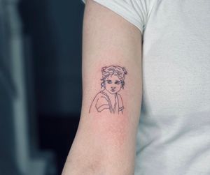 Get a stunning illustrative fine line tattoo of a girl, expertly done by Tal. A perfect blend of delicate details and artistic flair.