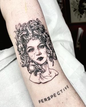 Unique dotwork tattoo of a fierce lady inspired by the mythological Medusa, skillfully done by artist Beyza Taser.