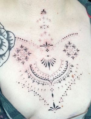 Experience the intricate beauty of dainty blackwork designs by talented artist Beyza Taser. Perfect for those seeking a unique and elegant tattoo.