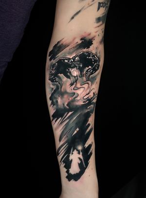 Stunning black and gray illustrative tattoo featuring Gandalf facing off against the Balrog from Lord of the Rings. By Craig Hicks.
