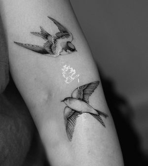 Get a beautifully detailed illustrative swallow tattoo by the talented artist Victoria. A symbol of freedom and loyalty.