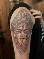 Experience the intricate beauty of Kali depicted in ornamental style by renowned artist Claudia Vicente.