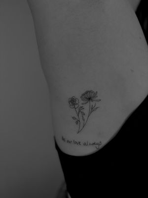 Small lettering and illustrative style flower tattoo created by talented artist Ruth Hall.