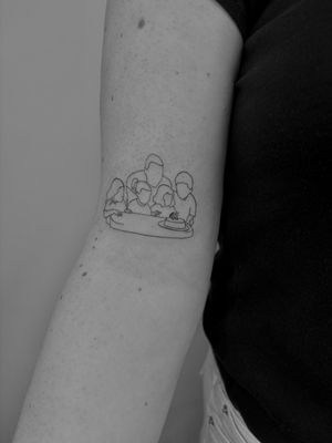 Celebrate your family's bond with this fine line and illustrative tattoo featuring an elegant outline design symbolizing the importance of birthdays. Created by tattoo artist Ruth Hall.