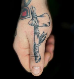 Traditional tomahawk thumb tattoo