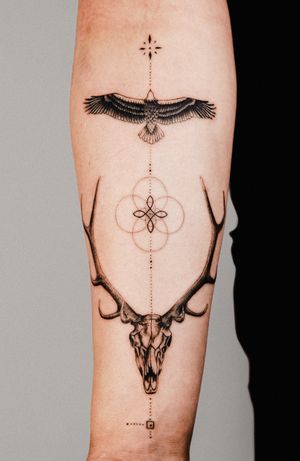 Unique black and gray design by Gabriele Edu combining geometric shapes and fine line details to create a stunning deer motif tattoo.