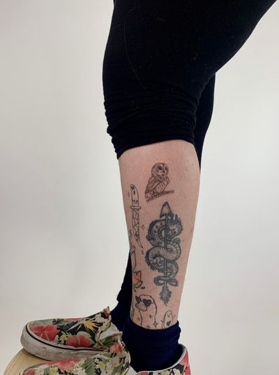 Get inked with a captivating illustrative tattoo by Chloe Hartland featuring an owl, dragon, and patchwork dagger design.