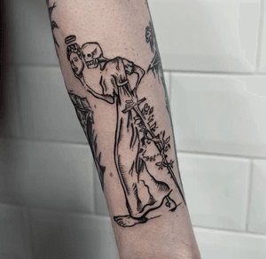 Medieval-inspired illustrative tattoo by Adam McDade featuring a striking and detailed reaper design.