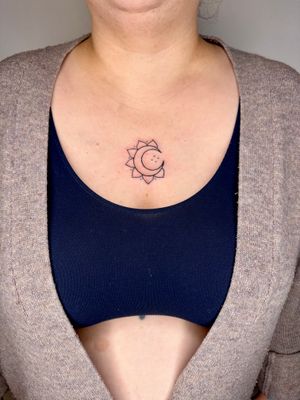 Capture the beauty of the sun and moon with this delicate illustrative design by jadeshaw_tattoos. Perfect for celestial lovers.