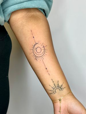 Embrace the balance of night and day with a sun and moon tattoo by jadeshaw_tattoos. Precision meets symbolism in this unique design.