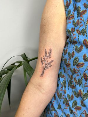 Elegant fine line and illustrative tattoo by jadeshaw_tattoos, featuring dainty and intricate floral bouquet design.