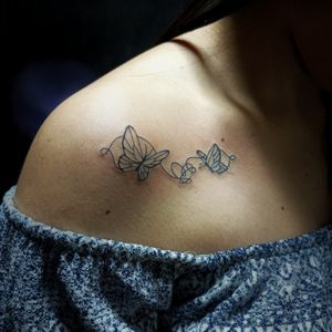 Butterfly shoulder tattoo
