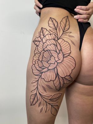 Admire the intricate details of this illustrative peony flower tattoo that showcases Joanna Webb's exceptional talent in tattoo artistry.
