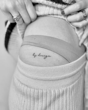 Exquisite fine line tattoo with intricate small lettering, expertly done by talented artist Ruth Hall.