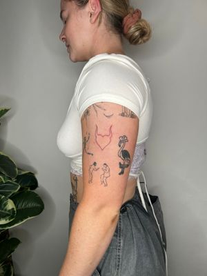Get a beautifully intricate heart tattoo with fine line work and illustrative style by the talented artist Emma InkBaby.
