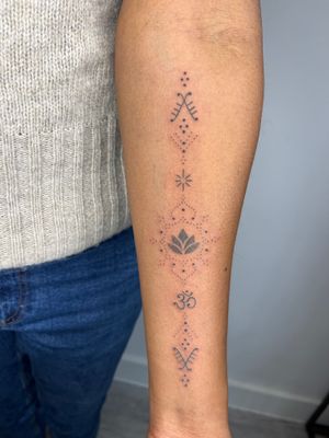 Experience the artistry of Indigo Forever Tattoos with this detailed dotwork and hand-poked ornamental design.