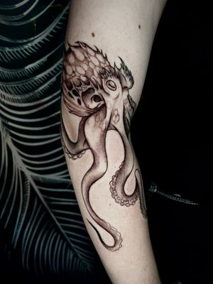 Get a stunning illustrative octopus tattoo by the talented artist Claudia Whiteheart. Dive into the deep with this unique and detailed design.
