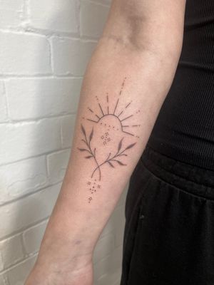 Intricate dotwork and fine line design of sun intertwined with branch and vine by Marketa.handpoke.