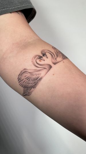 Matching swan tattoos for best friends 
