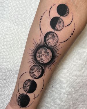 Unique dotwork illustrative tattoo of moon phases by Andrew Garinther. Perfect for lunar enthusiasts.