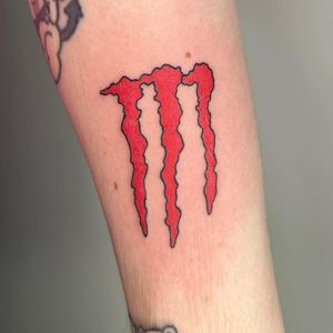 Illustrative tattoo of the iconic Monster Energy logo by tattoo artist Zanzi La Vey.