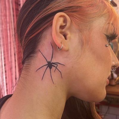 Bold and detailed blackwork spider tattoo by renowned artist Zanzi La Vey. Perfect for those who appreciate dark and intricate designs.