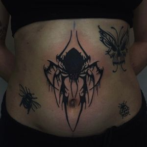 Embrace the mystical fusion of blackwork, tribal, and illustrative styles with this spider cyber sigil tattoo by the talented Zanzi La Vey.