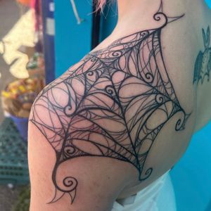 A stunning blackwork tattoo of a detailed and illustrative web motif by Zanzi La Vey. Perfect for those who love unique and intricate designs.