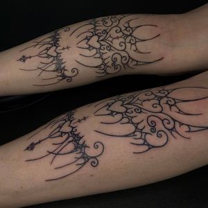 Explore the beauty of ornamental and illustrative patterns in this stunning blackwork tattoo by Zanzi La Vey.