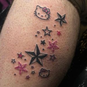 Get inked with the adorable kawaii style by Zanzi La Vey, featuring a cute Hello Kitty with a nautical star design.