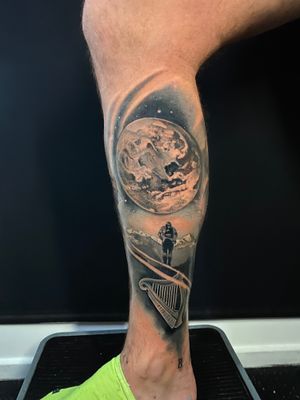 Experience the beauty of a moonlit hike with this stunning realism tattoo by Marie Terry.