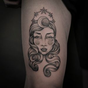 Get a mystical fortune teller tattoo by Jenny Dubet. This illustrative design features a beautiful gypsy woman, perfect for those drawn to the mysterious and enchanting.