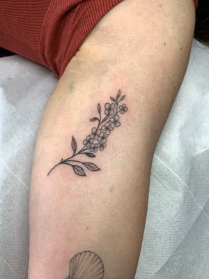 Admire the intricate details of this flower, branch, sprig, and twig tattoo by jadeshaw_tattoos. A stunning piece of illustrative art.