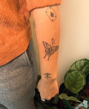 Delicate and intricate hand-poke illustration of a beautiful butterfly by the talented artist jadeshaw. A timeless and elegant design for those who appreciate unique artistry.