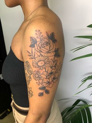 Unique illustrative rose tattoo design on dark skin by talented artist jadeshaw_tattoos. Perfect for a bold and vibrant statement.