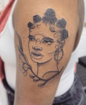 Beautiful illustrative tattoo of a dark-skinned African lady, done by the talented artist jadeshaw_tattoos.