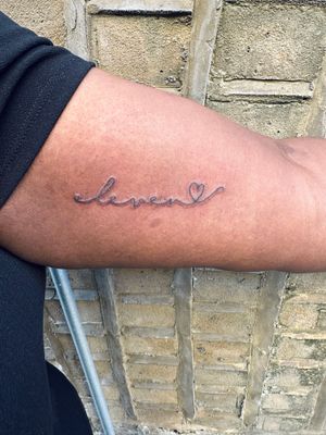 Elegant small lettering tattoo by jadeshaw_tattoos, featuring delicate fine line work for a beautiful and subtle design.