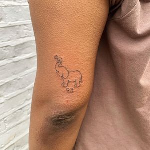 Fine line and illustrative style elephant tattoo by jadeshaw_tattoos. Simple yet striking design that emphasizes the beauty of minimalism.