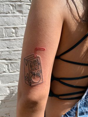 Check out this fun illustrative tattoo by jadeshaw_tattoos featuring a dumb bitch juice box design.